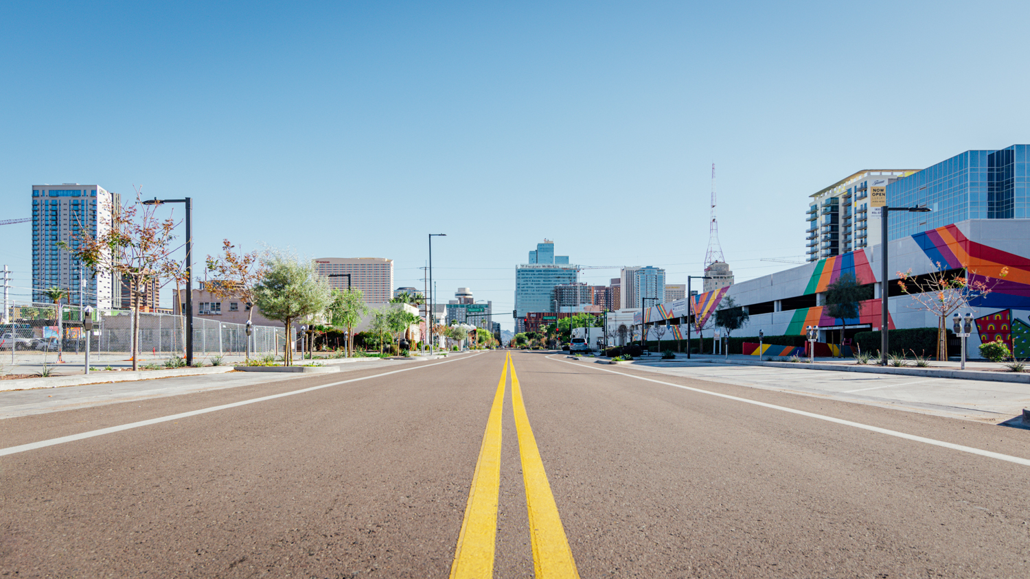 Photo at a low perspective looking towards downtown Phoenix.